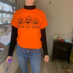 Cute Trick Or Treat Halloween Pumpkin Shirt. New Never Worn Except For These Pictures. Great For Fall Pumpkin Pictures Casual Orange Tops For Halloween, Spooky Orange Long Sleeve Tops, Orange Long Sleeve Spooky Top, Spooky Orange T-shirt For Fall, Spooky Orange Crew Neck Top, Spooky Long Sleeve Orange T-shirt, Spooky Long-sleeve Orange T-shirt, Spooky Orange Long Sleeve T-shirt, Orange Crew Neck Top For Halloween