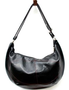 These versatile oversized hobo bags with cross-body straps are favorite with urban dwellers. A large hobo bag can hold an iPad, paperwork, a sweater, or a pair of shoes, plus your essentials to effortlessly take you from work to happy hour. Created from durable, machine-washable, water-resistant glazed fabric, embellished with curved contrast stitching and lined with buttery-soft faux suede. Dimensions: 10.5" h x 19.5" w x 4"d Zipper opening: 13" wide Strap: Long 1.5" wide crossbody strap that i Modern Hobo Bag With Adjustable Strap, Hobo Bag With Detachable Strap, Large Hobo Bag, Hobo Crossbody Bag, Foxtrot, Vegan Bags, Navy Fashion, Black White Gold, Medium Tote