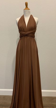 a brown dress on a mannequin dummy