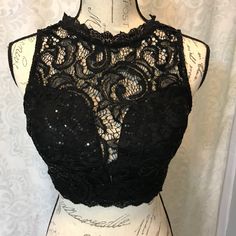 Instantly Become The Center Of Attention And Leave Everyone Speechless When You Enter The Room In This Lacy Black Crop Top With Sequence. New With Tags. Size Xs. Sleeveless Lace Crop Top For Night Out, Backless Lace Party Tops, Backless Lace Top For Night Out, Backless Lace Back Intimate For Party, Black Fitted Backless Crop Top, Fitted Black Backless Crop Top, Stretch Lace Crop Top For Night Out, Backless Black Tops For Night Out, Black Backless Party Top