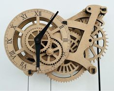 a wooden clock with gears attached to it