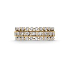 two tone gold and white diamond ring with three rows of diamonds on each band, set in