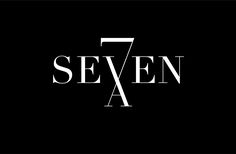 seven seven logo on a black background with white letters and the number seven below it