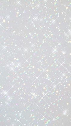 an abstract background with white stars and sparkles