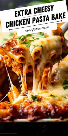 a fork full of cheesy chicken pasta bake is being lifted from the casserole dish