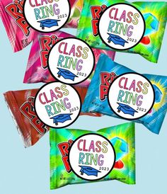 four colorful candy bags with the words class ring on them