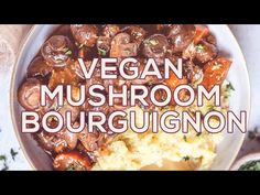 vegan mushroom bourgugion recipe on a plate with mushrooms and mashed potatoes