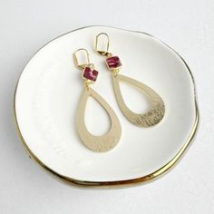 These stunning gold statement earrings are perfect for the holidays with their beautiful burgundy mojave gemstone accents. Let these gold statement earrings elevate your outfit! Long Statement Earrings, Gold Statement Earrings, Gold Earrings Dangle, Silver Pieces, Jewelry Case, Ear Jewelry, Stone Pendants, Gold Plating, Gemstone Earrings