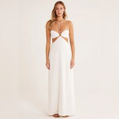 Relaxed Maxi Skirt With Fitted Bandeau Bra And Exposed Back, Featuring 3 Gold Rings At Neck And Adjustable Straps. Fully Lined. Elegant White Cutout Dress, Chic White Backless Maxi Dress, White Halter Neck Dress With Cutout, White Backless Cutout Dress, White Cutout Backless Dress, Elegant Off White Maxi Dress For Beach, Elegant Beach Dress With Cutout Details, White Backless Dress For Brunch, Elegant Beach Dress With Cutout