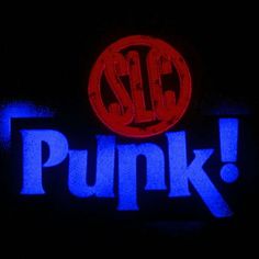 a neon sign with the word punk on it in blue and red letters that read, slc punk