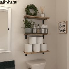 the bathroom is clean and ready to be used as a storage area for toilet paper