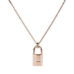 This Necklace is in 18k rose gold and set with 19 diamonds totaling .09 carats. Origin: France Condition: Pristine; new or never worn Accompanied by: Hermes box and dustbag Measurements: Length: 16 in, Pendant 0.72" x 0.5" Luxury Pink Gold Necklace For Formal Occasions, Timeless Rose Gold Diamond Necklace For Everyday Luxury, Timeless Rose Gold Diamond Pendant Necklace, Rose Gold Diamond Necklace For Everyday Luxury, Rose Gold Pendant Diamond Necklace, Luxury Rose Gold Diamond Necklace For Formal Events, Luxury Rose Gold Necklaces, Everyday Luxury Diamond Rose Gold Necklace, Luxury 14k Rose Gold Jewelry In Pink Gold