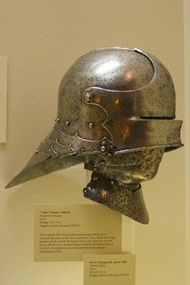 a helmet is on display in a museum