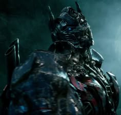 an image of a robot that is in the dark knight armor with his hands on his hips