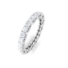 Product Details No matter what your style, the Minimal Round Diamond Eternity Ring is a beautiful and timeless way to express your love. This exquisite ring features a continuous band of round diamonds, each one carefully set in trellis setting. Whether you are celebrating your engagement, wedding anniversary, or simply your commitment to each other, the ring is a symbol of your enduring love. Product Information SKU SHP-RINGS062016008 Width 3.2 mm Height 2.5 mm Weight 4.16 gm (Approximate) DIAM Diamond Eternity Ring, What's Your Style, 18k Yellow Gold Ring, Eternity Ring Diamond, Ring Sizer, Diamond Eternity, Quality Diamonds, Engagement Wedding, Yellow Gold Rings