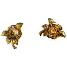 An earring that celebrates the beauty of the rose, this rose stud pair is a perfect piece for any ensemble as well as a great gift option. Handmade in the USA. Plated on brass. Additional Information: Material: 24K Gold, Brass Dimensions: W 0.75 x L 0.5 x H 1 in Available in other finish options: Sterling Silver, Rose Gold, Gunmetal Rose Gold Flower-shaped Metal Earrings, Vintage Brass Flower Earrings, Hibiscus Cluster Earrings Bronze, Silver Brass Flower-shaped Earrings, Bronze Brass Flower-shaped Jewelry, Jewelry Earrings Studs, Or Rose, Great Gifts, Plating