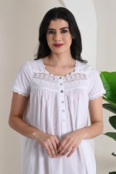 The perfect blend of comfort and charm with our cotton poplin nightgown, featuring short sleeves and a beautifully crafted lace trim neckline. Made from crisp, breathable cotton poplin, this nightgown offers a soft touch against the skin, ensuring a comfortable fit for warm nights. The short sleeves provide a relaxed yet polished look, while the elegant lace trim at the neckline adds a delicate, feminine touch. Falling gracefully to mid-calf, this nightgown showcases a flattering silhouette that effortlessly combines style and ease. Model (Daniele Sanfer) is 5'9"/ 179cm and wearing XS size dress with length 120 cm. Available Size : XS : Bust Upto 36 Inches S : Bust Upto 38 Inches M : Bust Upto 40 Inches L : Bust Upto 42 Inches XL : Bust Upto 44 Inches 2XL : Bust Upto 46 Inches 3XL : Bust U White Cotton Short Sleeve Nightgown, Feminine White Nightgown With Short Sleeves, White Summer Nightgown For Hospital, Feminine Short Sleeve Cotton Nightgown, Short Sleeve Lace Trim Sleepwear For Home, White Short Sleeve Nightgown, Summer Hospital Nightgown With Short Sleeves, Summer Feminine Short Sleeve Nightgown, Summer Nightgown With Lace Trim And Short Sleeves