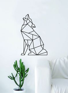 a black and white wall decal with a geometric dog sitting on it's side