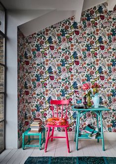 Pink Chair with Teal Side Tables and Colorful Wallpaper A combination of the pink chair, teal side tables, and colorful floral wallpaper offer a cozy and joyful reading nook. Grey Living Rooms, Room Wallpaper Designs