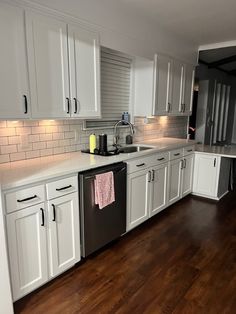 the kitchen is clean and ready for us to use it's new cabinets, counter tops, and dishwasher