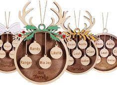 wooden christmas ornaments with names hanging from the top and reindeer antlers on each ornament