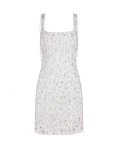 Thousands of shimmering moonbeam sequins and crystals shine on this refined mini dress. Fringing made of delicate glass beads hangs loosely and shimmers as you move. All of the embellishment is hand beaded by artisans, creating a dress that will be treasured for a lifetime. Featuring a square neckline and body skimming silhouette, the Eden Dress is the ultimate eveningwear piece and perfect for the modern bride. Material: 100% polyester White Dress With Crystals, Dress With Crystals, Eden Dress, Modern Dresses, The Eden, The Modern Bride, Shine On, Modern Bride, Guinea Bissau