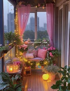 a balcony with lots of plants and lights on the windowsill, potted plants in front of the window