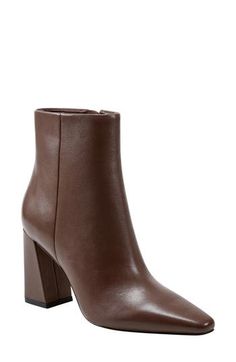 Boasting a clean-lined, sleek silhouette with a modern square toe and tapered block heel, this versatile leather bootie is a go-to cool-weather look. 3 1/2" heel(size 8.5) 4 3/4" shaft Leather upper/synthetic lining and sole Imported Fall Square Toe Boots With Heel Tab, Fall Boots With Heel Tab And Square Toe, Sleek Boots With Padded Block Heel, Sleek Block Heel Boots With Padded Heel, Fall Heeled Boots With Heel Tab For Work, Heeled Boots With Heel Tab For Fall Workwear, Fall Block Heel Boots With Heel Tab, Fall Boots With Block Heel And Heel Tab, Fall Faux Leather Square Toe Heels