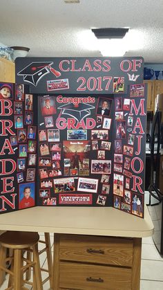 a graduation bulletin board with pictures on it