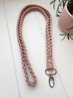 WELCOME TO THE PINK CACTUS SHOPPE -- sister shop to The Mint Cactus! These macrame lanyards are the perfect addition to your keys and/or photo ID! - Approx. 18 inches long (36 diameter) in the standard size, but we can made up to 21 inches long (42 inches diameter). - Made with cotton cord. - Includes your choice of a gold, silver or gunmetal alligator swivel clasp. -TWO-TONED -- if you want a two-toned lanyard, please include what colors you would like in the PERSONALIZATION section of the listing. - Variances in chord color or thickness may appear. View photo to see all possible color choices. Handmade Pink Lanyards For Everyday Use, Macrame Lanyards, Boho Key Holder, Macrame Lanyard, Pink Cactus, Lanyard Keychain, Phone Lanyard, Reusable Cup, View Photo