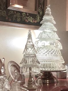 an assortment of glass items on a table