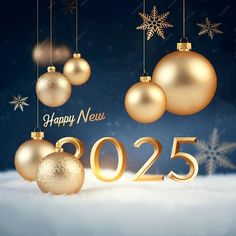 new year's greeting card with gold ornaments and snowflakes hanging from strings