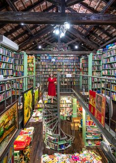 a room filled with lots of books in it