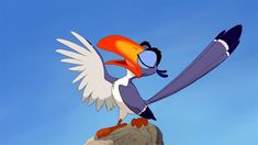 a cartoon bird with an orange beak and blue eyes