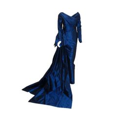 Description: Christian Dior vintage 1988 long blue gown This is a long royal blue silk taffeta gown by Christian Dior Haute Couture, from 1988-89. Long sleeves Wrapped front and back bodice Large bow on the side hip Two long trains Bust: 32 in. Waist: 27 in. Hips: 34 in. Length: 61 in. Provenance: Betsy Bloomingdale Details: Size: 27 Color: Blue Material: Silk TaffetaCondition: GoodBrand: Christian Dior Shipping: STANDARD: $9.95 EXPEDITED: $19.95 Blue Evening Dress With Long Train, Blue Taffeta Dress For Gala, Blue Fitted Taffeta Evening Dress, Blue Taffeta Floor-length Dresses, Blue Floor-length Taffeta Dresses, Floor-length Blue Taffeta Dresses, Formal Blue Taffeta Gown, Blue Taffeta Gown For Formal Occasions, Blue Vintage Floor-length Gown