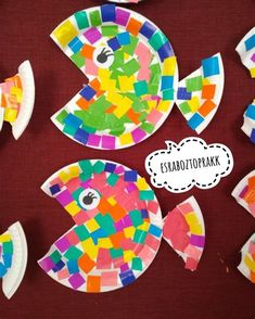 colorful paper plates with fish made out of them