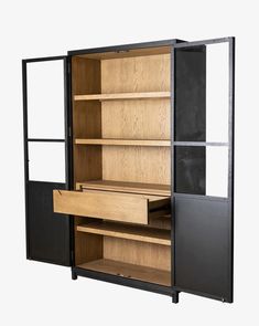 an open cabinet with shelves and drawers