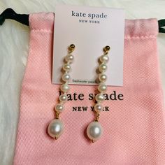 Kate Spade Pearl Play Linear Earrings New With Dust Bag Freshwater Pearl Plated Metal, Cubic Zirconia, Thread, Freshwater Pearl Titanium Posts, Signature Spade Clutch Backs Length: 2.5" Width: 0.45" Weight: 9.8g Kate Spade White Earrings For Gift, Elegant White Kate Spade Earrings, Kate Spade White Jewelry With Matching Earrings, Kate Spade White Jewelry Set With Matching Earrings, Kate Spade Dangle Earrings As A Gift, Kate Spade Dangle Earrings For Gifts, Elegant Kate Spade Dangle Jewelry, Linear Earrings, Kate Spade Earrings Stud