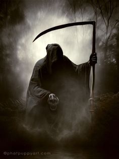 a man in a hooded outfit holding a scythe