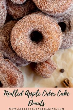 a pile of apple cider cake doughnuts sitting on top of each other