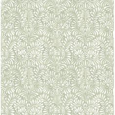 a green and white wallpaper with leaves on it