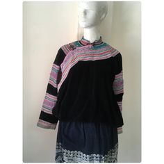 Vintage tribal Flower Hmong women tunic . Age is over 30 years and still very good condition. It is produced with handmade,hand and machine embroidered,hand and machine stitched appliqué,hand and machine sawed,hand woven in cotton.And the black fabric is velvet. Hand wash and separate in cold water. Measurement Length 51.5 cm Sleeve to sleeve 146 cm Arm length 44 cm Underarm width 40 cm Chest 92 cm Weight 320 grams Traditional Winter Festival Tops, Women Tunic, Hand Applique, Womens Tunics, Measurement Length, Black Fabric, 30 Years, Hand Woven, Cold Water