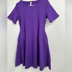 Armpit To Armpit Measures Approx 19.5” And Has Generous Stretch. Length Is Approx 38” Casual Purple Solid Color Dress, Stretch Solid Color Dresses With Short Sleeves, Stretch Dresses With Short Sleeves In Solid Color, Stretch Cotton Dresses With Crew Neck, Cotton Stretch Dresses With Crew Neck, Stretch Cotton Crew Neck Dresses, Casual Stretch Dresses With Short Sleeves, Casual Short Sleeve Stretch Dress, Fitted Cotton T-shirt Dress With Short Sleeves