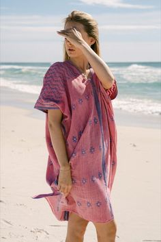 This one-of-a-kind huipil, or traditional kaftan dress, was handmade by female artisans in Oaxaca, Mexico. These talented women hand weave each piece on a waist loom from natural cotton. All threads are dyed with only natural materials, such as guava leaf, Brazilwood, mahogany and more. Bohemian Handloom Kaftan For Summer, Cotton Beach Dresses With Woven Motifs, Bohemian Handwoven Kaftan, Traditional Beach Kaftan With Natural Dye, Beach Cotton Kaftan With Woven Motifs, Summer Vacation Handwoven Kaftan, Handwoven Summer Vacation Kaftan, Traditional Kaftan With Natural Dye For Summer, Traditional Summer Kaftan With Natural Dye