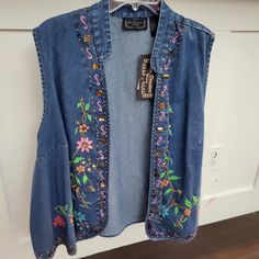 Questions? Leave A Comment Below! Casual Embroidered Denim Vest For Spring, Spring Beaded Denim Outerwear, Casual Denim Vest With Floral Embroidery For Spring, Casual Floral Embroidered Denim Vest For Spring, Beaded Outerwear For Spring Festival, Beaded Denim, Womens Denim Vest, Vintage Denim Vest, Fall Vest