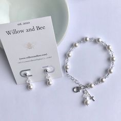 This lovely First Communion bracelet and earrings set is sure to be the perfect gift! The beautiful bracelet doubles as a single decade rosary. This classic bracelet has been a big seller as First Communion jewelry, Confirmation jewelry, Easter bracelet, Flower Girl gift, Maid-of-Honor jewelry, Bridesmaids matching bracelets, Mother-of-the-Bride jewelry, Godmother gift, and as Bridal jewelry. Description: -Bracelet measures 5 ½ inches plus a 1-inch extension chain -fits First Communion age (2nd White Bracelet For First Communion, White Bracelet Jewelry For First Communion, Classic Adjustable Jewelry For First Communion, White Sterling Silver Rosary Bracelet Gift, Elegant Sterling Silver Jewelry For First Communion, Nickel-free Rosary Bracelet As Gift, Dainty Hypoallergenic Jewelry For First Communion, Adjustable Jewelry For First Communion Mother's Day, Adjustable Jewelry For First Communion And Mother's Day