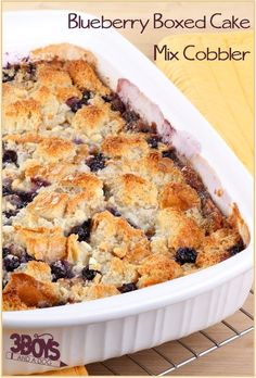 blueberry boxed cake mix cobbler in a white dish