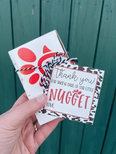 a hand holding up a card that says, thank you do what's in the white nugget love