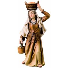 a statue of a woman carrying a basket on her head