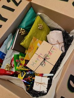 a box filled with lots of different types of candy and other things to put in it